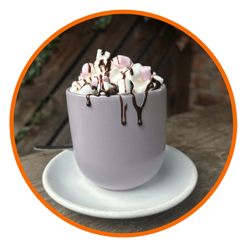 a hot chocolate with cream and marshmallows