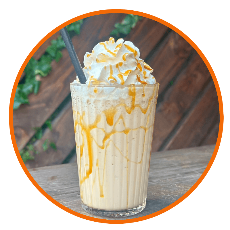 a milkshake with cream on top